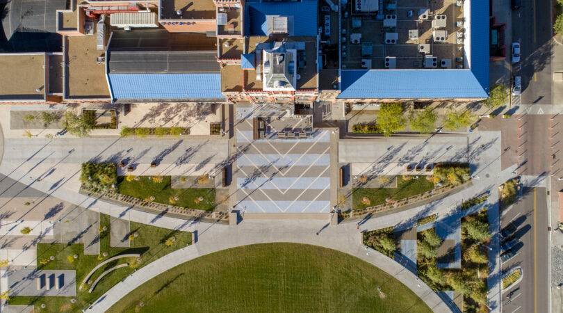 Aerial view of Tivoli Quad, showcasing pathways, greenery, and adjacent buildings.