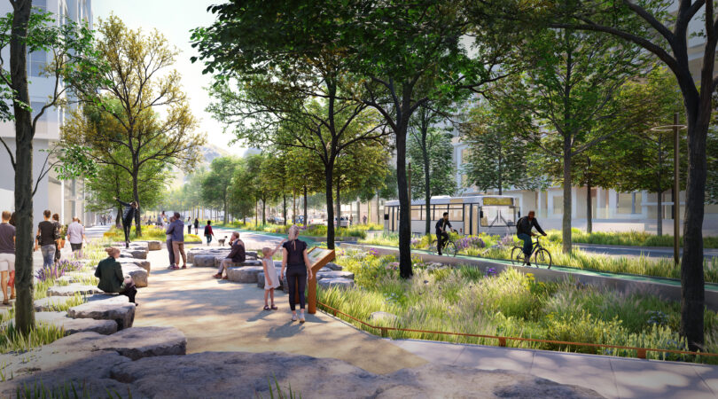 Green loop with people walking and biking amidst lush trees and pathways